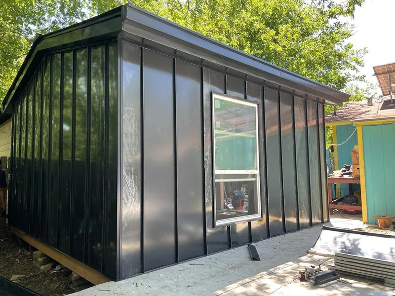 Black standing seam metal wall panels for Metal Roof Installation in Kings Point