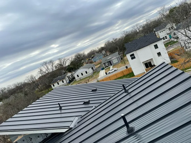 Standing seam metal roof panels with vents for Skylight Repair in Kings Point